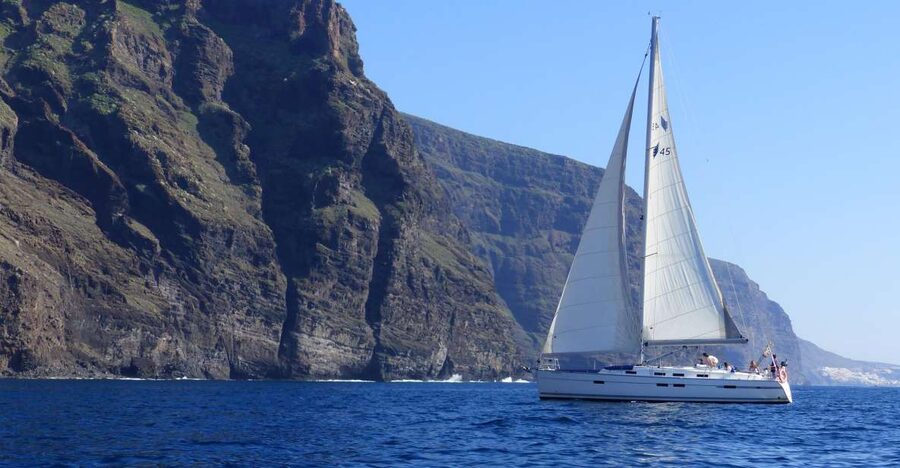 Tenerife: Los Gigantes Whale Watching Cruise by Sail Boat - Raising the sail when conditions allow