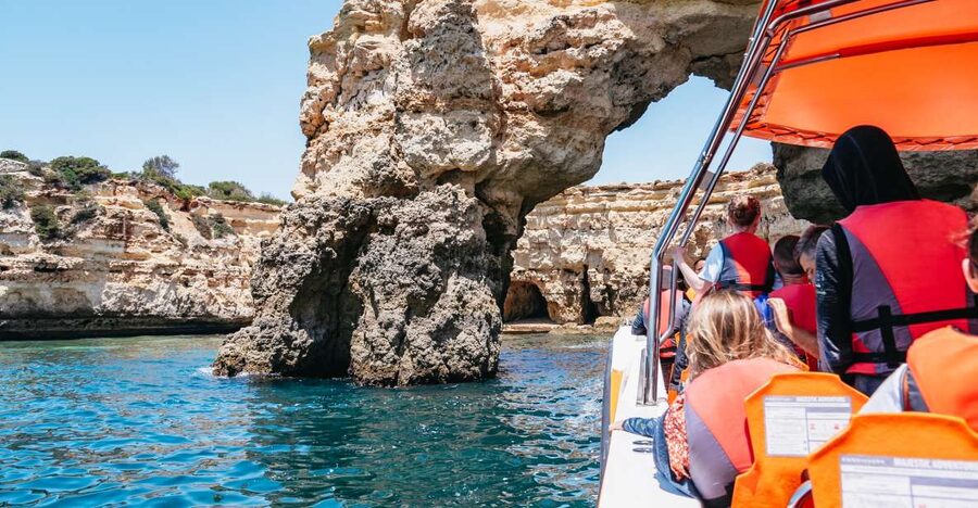 Vilamoura: Benagil Cave Boat Tour with Entry&Dolphin search - Seeing the smaller caves and secluded beaches